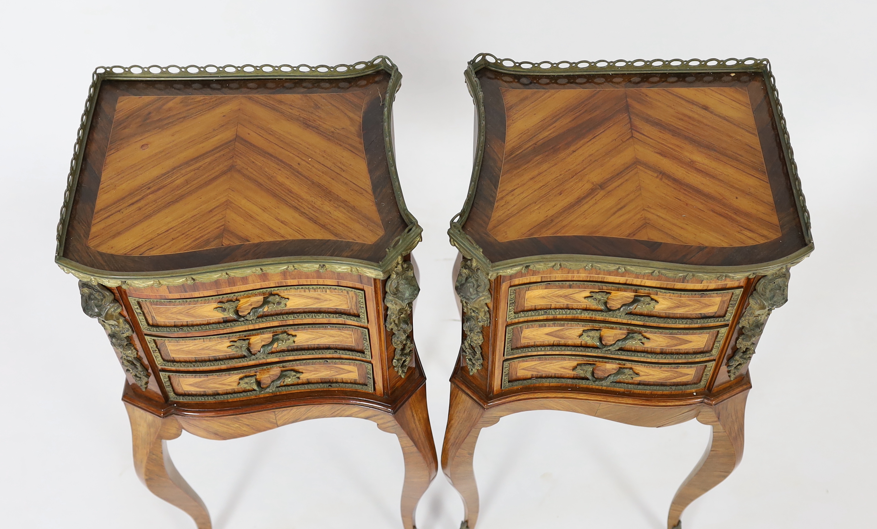 A pair of Louis XVI style ormolu mounted kingwood bedside chests, 34cm wide, 27cm deep, 74cm high